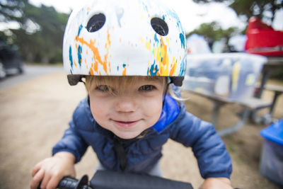 One year old girl biking with determination.