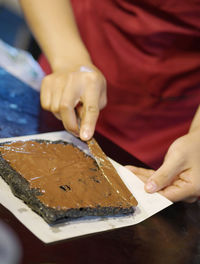 Midsection of woman preparing food