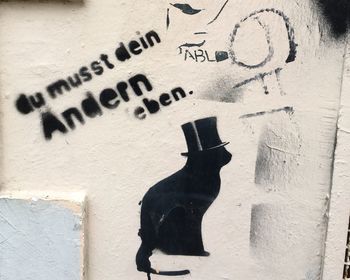 Close-up of text on sand at beach