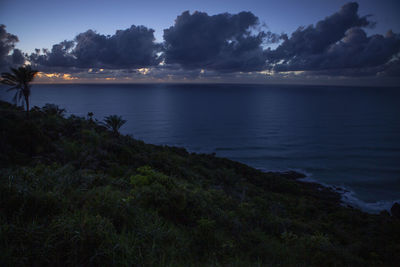 Scenic view of sea against sky at sunset