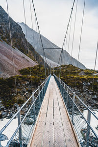 View of suspension bridge against sky