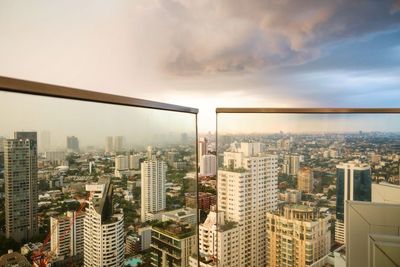 Modern cityscape against sky