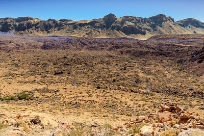 Rock formations in desert against sky