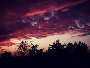 Low angle view of cloudy sky at sunset