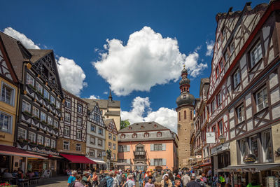 Buildings in city against sky