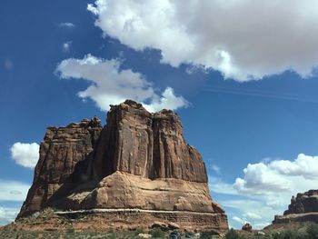 Low angle view of rock formation against cloudy sky moab utah canyon national park