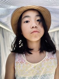 Young woman wearing hat