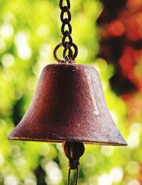 Close-up of bell against blurred plants