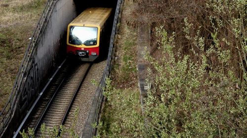 Train passing through tunnel