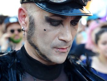 Close-up portrait of young man looking away