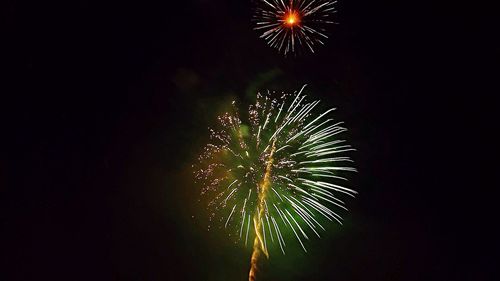 Low angle view of firework display