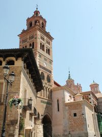 Low angle view of historic building against clear sky