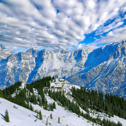 Aerial view of ski camping near zell am see tourist resort in austria alps under dramatic coudy sky