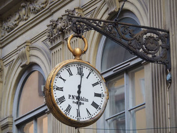 Low angle view of clock on building