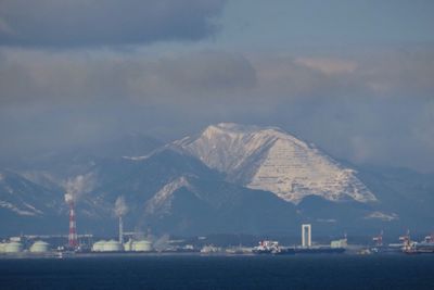 Scenic view of mountains against sky during winter