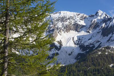 Scenic view of mountains against sky during winter