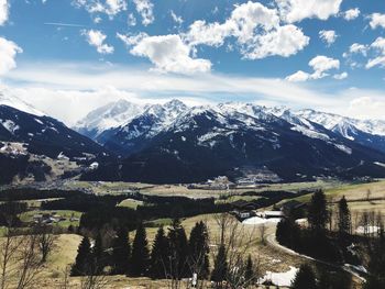 Scenic view of snowcapped mountains against sky