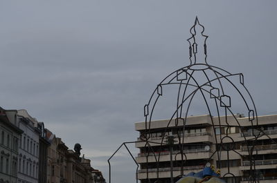Low angle view of buildings in city against sky