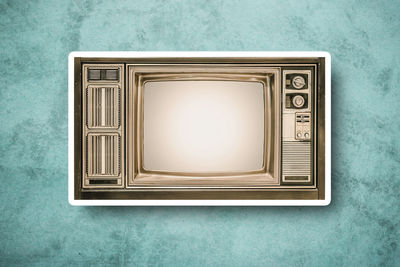 Directly above shot of retro television set on table