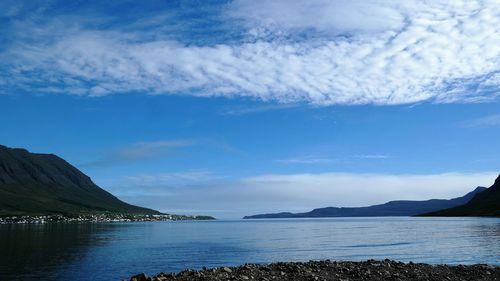 Scenic view of sea against cloudy sky