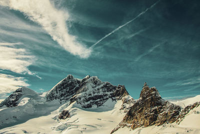 Snowy mountains in switzerland, winter landscape. jungfraujoch,