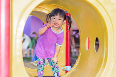 Portrait of smiling girl in playground