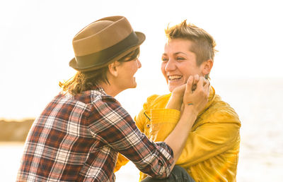 Happy lesbian couple at park