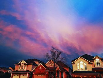 Low angle view of houses against sky