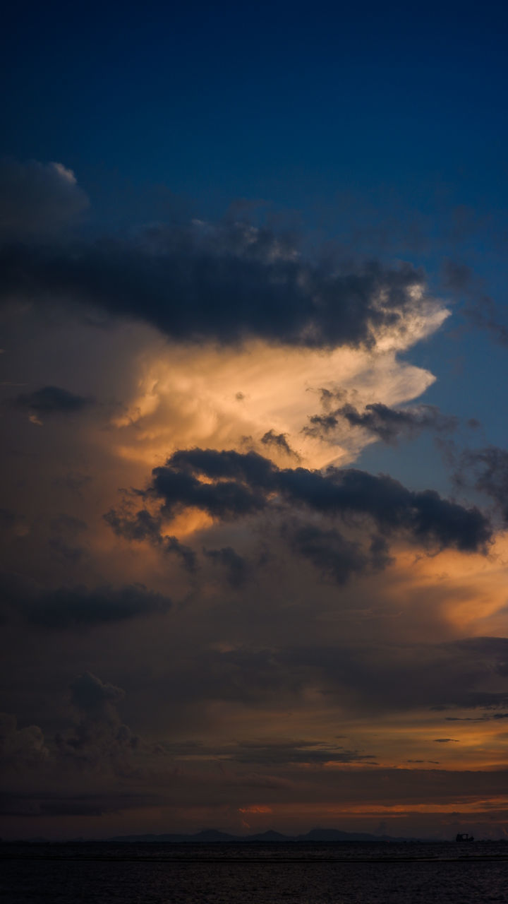 SCENIC VIEW OF SEA AGAINST ORANGE SKY