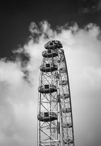 Low angle view of ferris wheel against sky