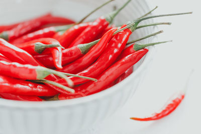 Close-up of red chili peppers in bowl