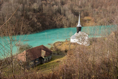 Abandoned orthodox church on lakeside. geamana, rosia montana, romania