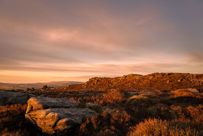 Trigonometry point on the roaches at sunset in the staffordshire, peak district national park, uk.