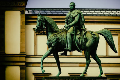 Low angle view of statue of historic building