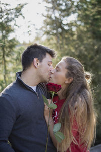 Young couple kissing outdoors