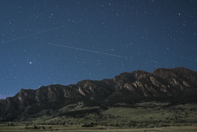 Scenic view of mountains against clear sky