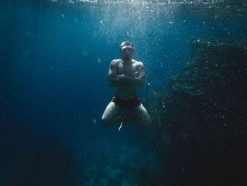 Man swimming in sea