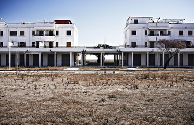 View of buildings against clear sky