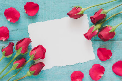 Directly above shot of red rose on table