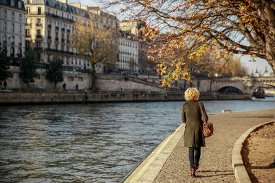 Woman standing in river