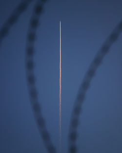 Low angle view of vapor trail in sky