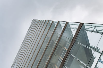 Low angle view of modern building against sky