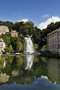 Reflection of waterfall in water , italy , isola liri