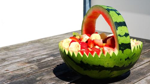 Close-up of fruits in plate on table