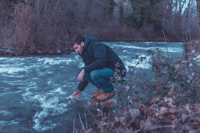 Full length of man in water