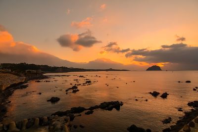 Scenic view of sea against sky during sunset