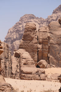 Rock formations in wasi rum against clear sky