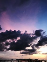 Low angle view of dramatic sky during sunset