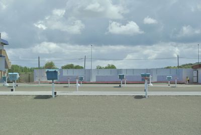 Scenic view of soccer field against sky