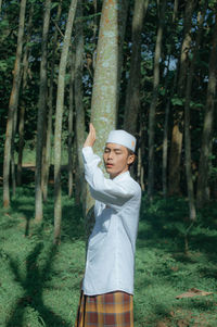 Portrait of young people muslim indonesia standing in forest